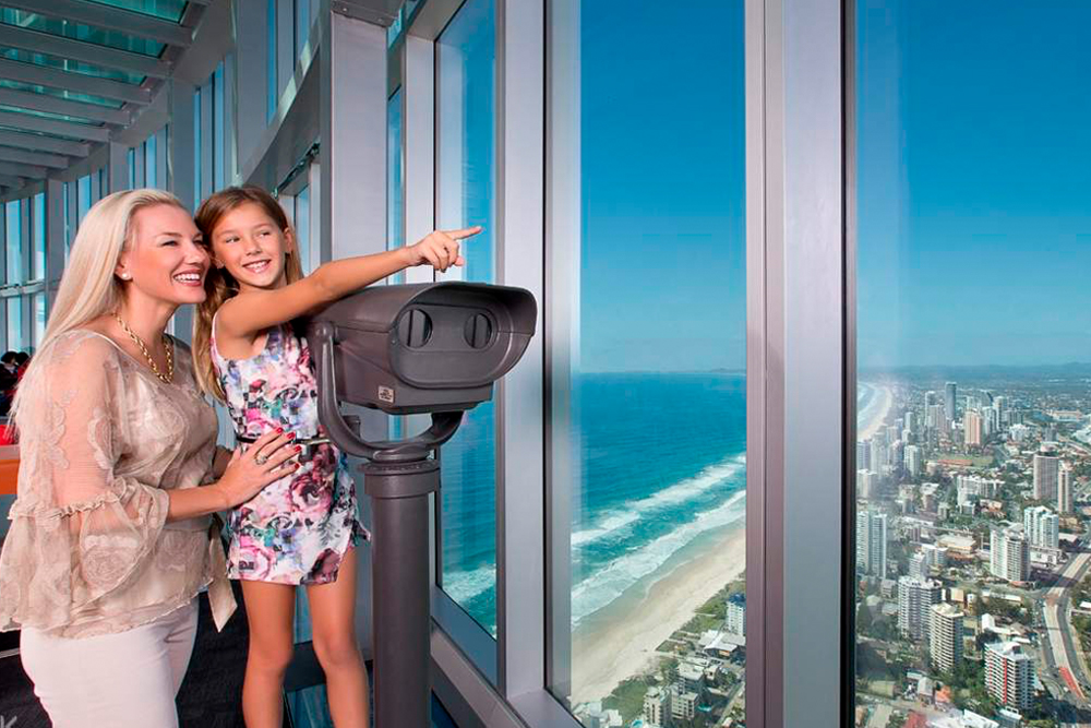 SkyPoint Observation Deck Ticket - Gold Coast - Visit the SkyPoint Observation Deck in Gold Coast for panoramic 360° views from the top of the Q1 building. Enjoy breathtaking sights of the ocean, city skyline, and hinterland. Relax at the SkyPoint Bistro & Bar, all from 230 meters above sea level. A must-see attraction for tourists and locals alike! SkyPoint Observation Deck Ticket - Gold Coast - Image 1 of 5