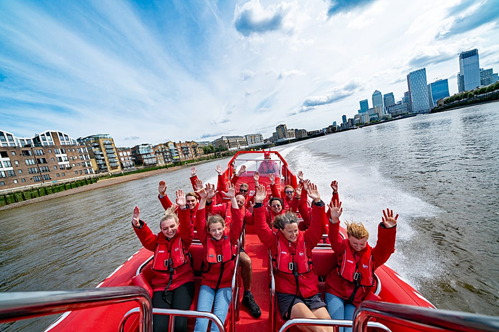 Thames Speedboat Experience in London - Get ready for a thrilling adventure with the Thames Speedboat Experience in London! Hop onto a fast boat and race along the famous River Thames, passing by Big Ben, the London Eye, Tower Bridge, and more. Enjoy exciting twists, turns, and high speeds with fun music playing in the background. Your guide will share cool facts and stories about London as you ride. The journey starts with a slow cruise so you can take photos, then speeds up for real fun. Feel the wind in your hair and the splash of the river as you zoom across the water. Perfect for families, couples, and friends who love action and sightseeing, this is not just a boat ride — it’s an exciting way to see the city. Create amazing memories and enjoy one of the most fun experiences London has to offer Thames Speedboat Experience in London - Image 1 of 5