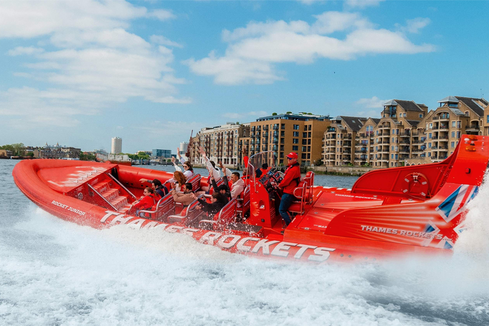 Thames Speedboat Experience in London - Get ready for a thrilling adventure with the Thames Speedboat Experience in London! Hop onto a fast boat and race along the famous River Thames, passing by Big Ben, the London Eye, Tower Bridge, and more. Enjoy exciting twists, turns, and high speeds with fun music playing in the background. Your guide will share cool facts and stories about London as you ride. The journey starts with a slow cruise so you can take photos, then speeds up for real fun. Feel the wind in your hair and the splash of the river as you zoom across the water. Perfect for families, couples, and friends who love action and sightseeing, this is not just a boat ride — it’s an exciting way to see the city. Create amazing memories and enjoy one of the most fun experiences London has to offer Thames Speedboat Experience in London - Image 4 of 5