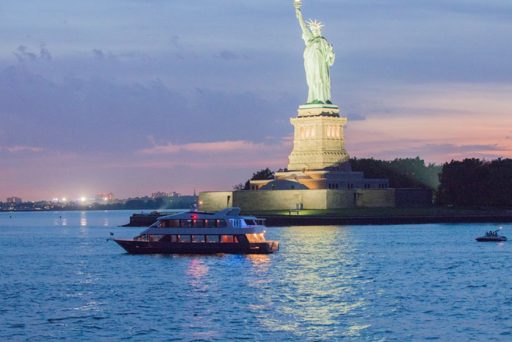 Statue Of Liberty And Ellis Island Guided Tour In New York - Join a guided tour to explore two of New York’s most important landmarks — the Statue of Liberty and Ellis Island. Start your journey with a scenic ferry ride across the harbor. Visit Liberty Island to see the world-famous Statue of Liberty up close and learn its incredible story. Continue to Ellis Island, where millions of immigrants first arrived in America. Walk through the historic Immigration Museum and hear powerful stories from the past. Your expert guide will share interesting facts and history along the way. Enjoy amazing views of the New York skyline from the islands. This tour is perfect for anyone wanting to experience American history and culture Statue Of Liberty And Ellis Island Guided Tour In New York - Image 1 of 5