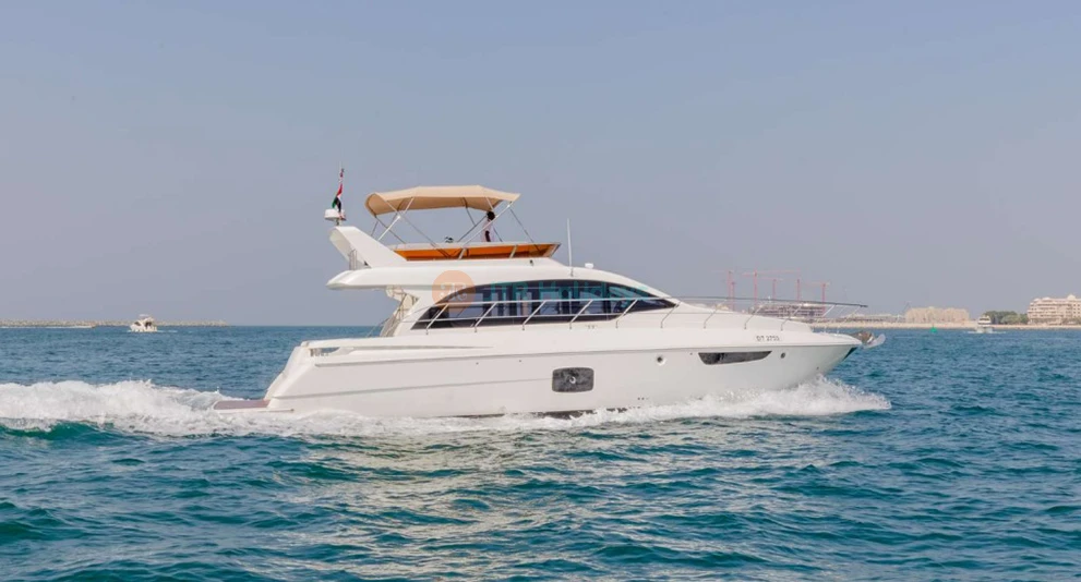 Fin Yacht Rental Dubai - 52 FT - Experience luxury on the water with Fin Yacht Rental Dubai – 52 FT. This private yacht offers an unforgettable cruise along Dubai's beautiful coastline, with stunning views of iconic landmarks like the Burj Al Arab and Atlantis The Palm. Ideal for small groups or special celebrations, the yacht features spacious decks, modern amenities, and a professional crew to ensure a memorable experience on the water. Fin Yacht Rental Dubai - 52 FT - Image 1 of 5