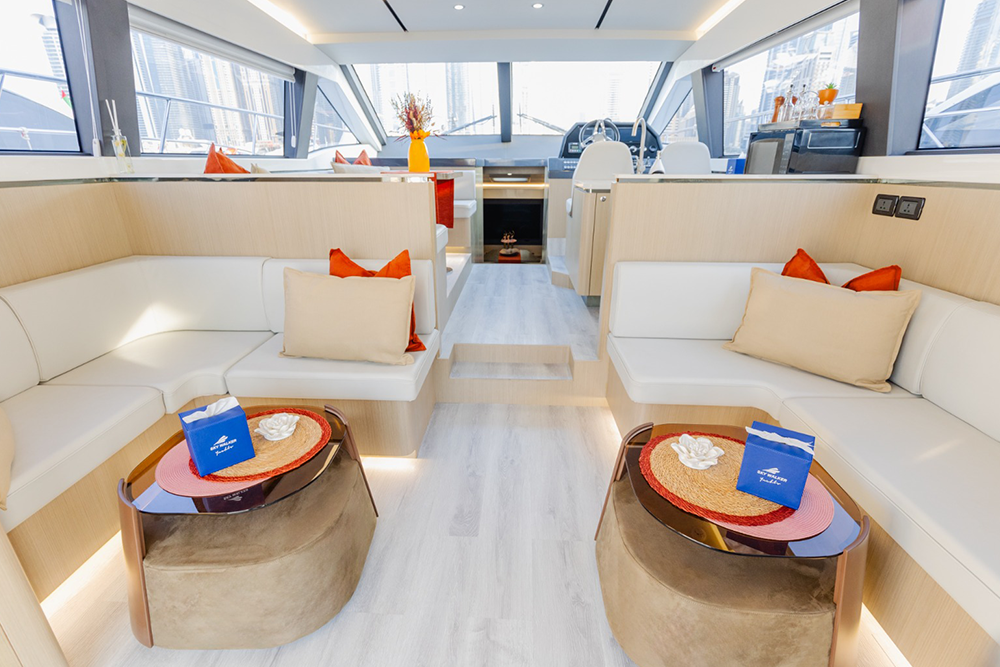 Fin Yacht Rental Dubai - 52 FT - Experience luxury on the water with Fin Yacht Rental Dubai – 52 FT. This private yacht offers an unforgettable cruise along Dubai's beautiful coastline, with stunning views of iconic landmarks like the Burj Al Arab and Atlantis The Palm. Ideal for small groups or special celebrations, the yacht features spacious decks, modern amenities, and a professional crew to ensure a memorable experience on the water. Fin Yacht Rental Dubai - 52 FT - Image 4 of 5