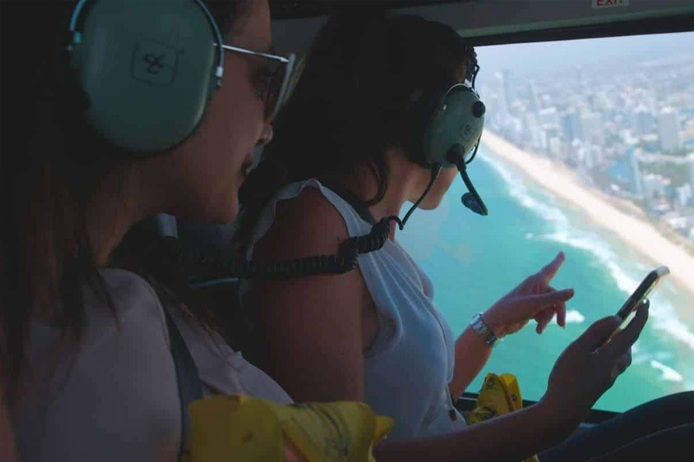 Gold Coast Helicopter Flight - Experience the excitement of a Gold Coast Helicopter Flight as you soar above the stunning coastline, golden beaches, and iconic landmarks. Enjoy breathtaking aerial views of the Broadwater, lush hinterland, and Southern Gold Coast on this unforgettable adventure. Whether you're capturing photos or simply taking in the scenery, this scenic flight offers a unique way to explore the beauty of the Gold Coast from the sky. Gold Coast Helicopter Flight - Image 2 of 5