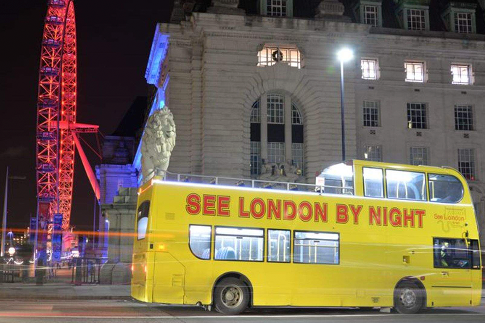 See London By Night - Discover the magic of London after dark with an enchanting evening sightseeing bus tour. Witness the city’s most iconic landmarks—such as Big Ben, the London Eye, Tower Bridge, and St. Paul’s Cathedral—illuminated in all their nighttime glory. Ride comfortably on an open-top double-decker bus and enjoy panoramic views of the capital lit up against the night sky. Learn fascinating facts and stories with live or audio commentary as you pass historic monuments and vibrant neighborhoods. Capture picture-perfect moments of London’s skyline glowing at night. Ideal for first-time visitors or anyone wanting a fresh perspective on the city. This relaxing and scenic tour offers a unique way to explore London’s charm after sunset. Book your ticket for a memorable night in the heart of the UK’s capital See London By Night - Image 1 of 5