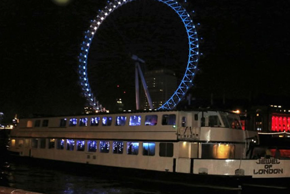 Evening Cruise on the River Thames - Experience the magic of London at night with a relaxing evening cruise on the River Thames. Glide past the city’s most iconic landmarks beautifully illuminated after sunset, including Tower Bridge, the London Eye, St. Paul’s Cathedral, and Big Ben. The cruise offers a peaceful and romantic way to enjoy the city away from the crowds. Onboard commentary brings London’s history and skyline to life as you sail. Sip a drink, enjoy light music, and take in the stunning views from the open-air deck. It’s perfect for couples, tourists, or anyone looking for a unique London night out. Capture unforgettable photos of the glowing city skyline. This scenic cruise is one of the best ways to see London’s charm by night. A must-do experience on your visit to the capital. Evening Cruise on the River Thames - Image 4 of 5