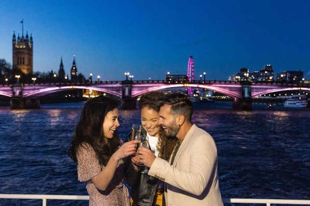 London Dinner Cruise on the River Thames - Embark on an unforgettable evening aboard a luxury dinner cruise along the River Thames. As London's iconic landmarks illuminate the night sky, enjoy a sumptuous four-course meal prepared with the finest ingredients. Sip on a welcome glass of sparkling wine as you glide past the London Eye, Tower Bridge, and the Houses of Parliament. Live entertainment enhances the ambiance, creating a romantic and memorable atmosphere. Whether celebrating a special occasion or seeking a unique night out, this cruise offers an exceptional dining experience with panoramic city views. Relax in elegant surroundings and let the city's charm captivate you. An evening of fine dining, live music, and breathtaking sights awaits on this premier Thames River cruise London Dinner Cruise on the River Thames - Image 1 of 5