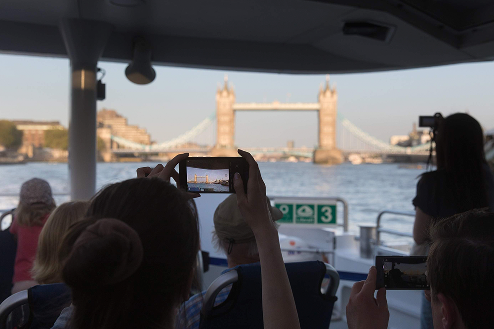 River Thames Hop-on Hop-off Boat by Thames Clippers - Discover London’s iconic landmarks aboard the River Thames Hop-On Hop-Off Boat by Thames Clippers. Enjoy flexible Thames river cruises and sightseeing tours, hopping on and off at major stops like Tower Bridge, Westminster, the London Eye, and Greenwich. Perfect for London attractions, family friendly activities, and hassle-free river transport, your Thames Clippers pass offers panoramic city views and expert onboard commentary. Book now for an unforgettable London boat tour experience. River Thames Hop-on Hop-off Boat by Thames Clippers - Image 3 of 5