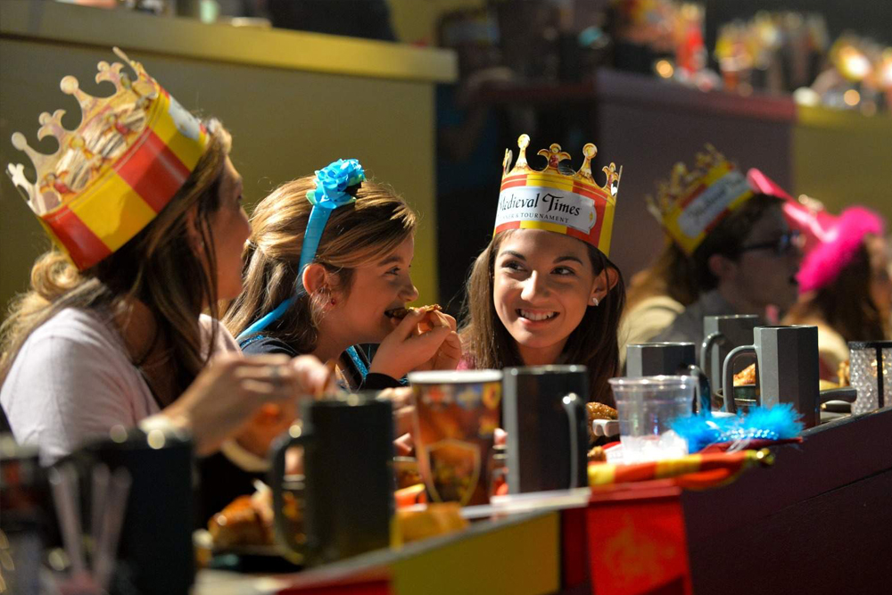 Medieval Times Dinner & Tournament Ticket - Enjoy a thrilling night at the Medieval Times Orlando Dinner and Tournament with live jousting, sword fights, and a royal feast. Book your Medieval Times Orlando ticket for a family-friendly show inside a real castle, complete with a four-course meal, knights, and medieval entertainment. Medieval Times Dinner & Tournament Ticket - Image 3 of 5