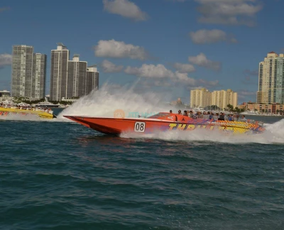 Thriller Miami Speedboat Adventures Tour - Feel the adrenaline on the Thriller Miami Speedboat Adventures Tour, a high-speed ride across Biscayne Bay past Star Island, Fisher Island, and the Miami skyline. Perfect for thrill-seekers and families, enjoy twists, turns, live narration, and celebrity home sightings. Multiple departures daily—book your Miami speedboat adventure today. Thriller Miami Speedboat Adventures Tour - Image 5 of 5