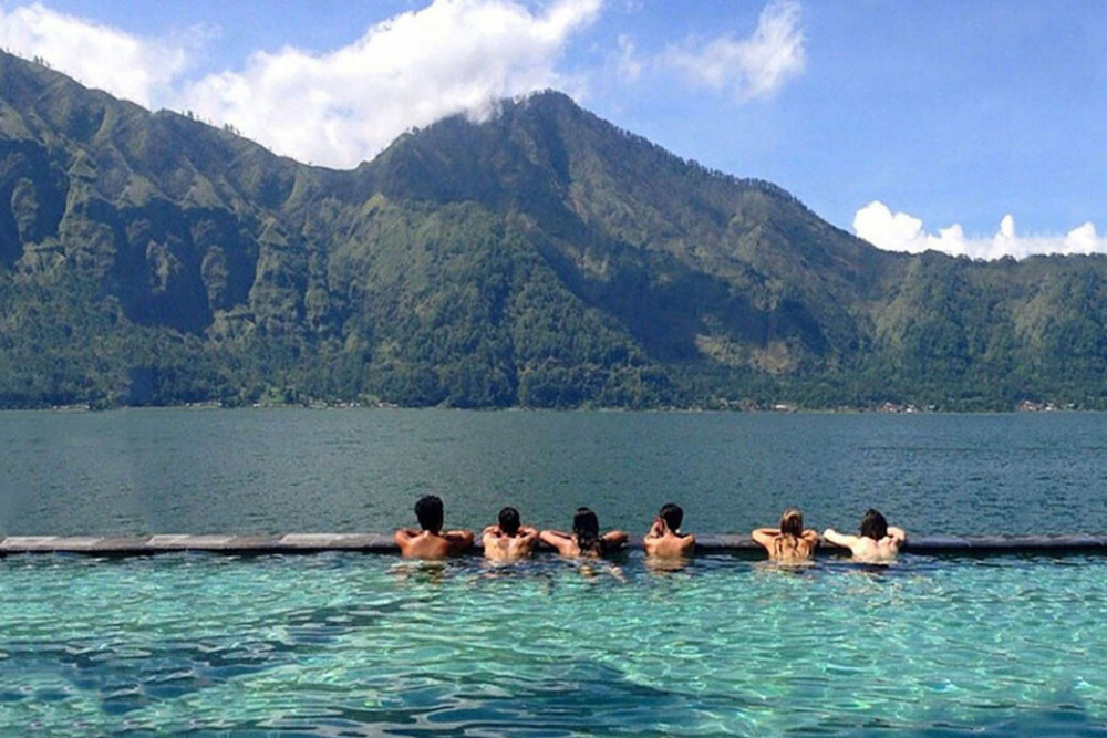 Mount Batur Quad Bike Tour and Hot Spring Visit - Embark on the ultimate Bali ATV adventure with our Mount Batur quad bike tour across rugged volcanic terrain and black lava fields. Enjoy panoramic crater lake views, then soak in the rejuvenating Batur hot springs. Book your Bali volcano tour, Bali quad bike experience, Bali nature tour, and adventure tour in Bali today. Mount Batur Quad Bike Tour and Hot Spring Visit - Image 4 of 5
