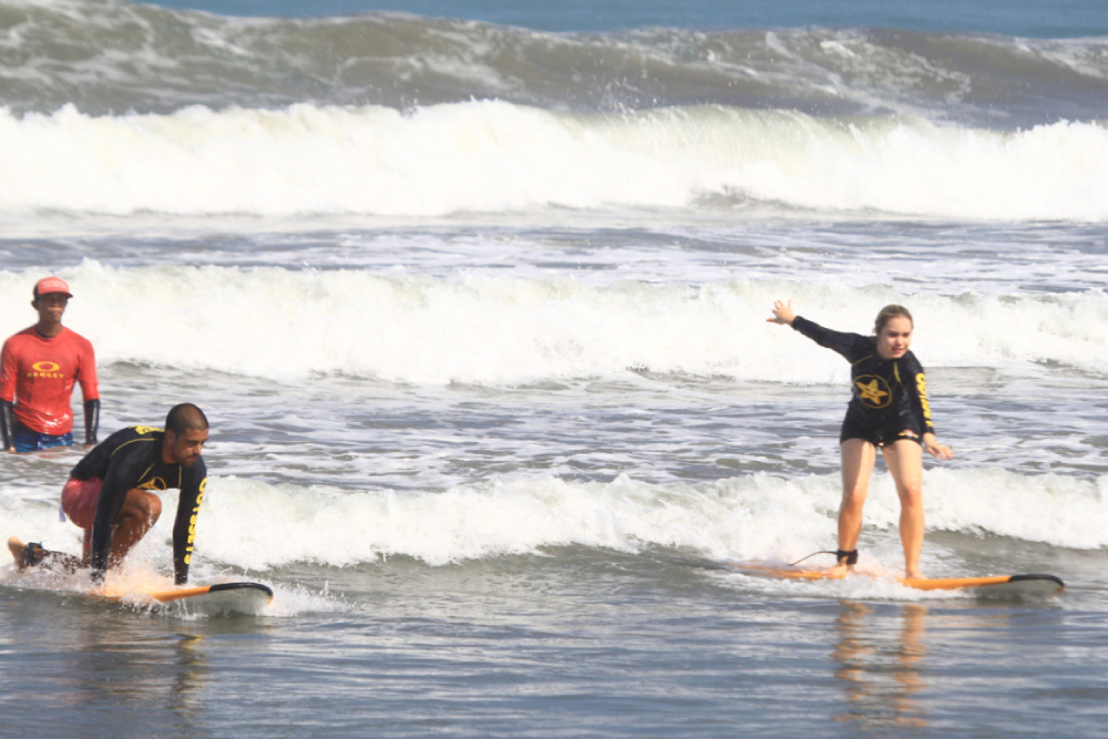 Surfing Lessons by Odysseys Surf School - Learn to surf on Bali’s iconic Kuta Beach with Odysseys Surf School. Join beginner-friendly Bali surf lessons and surf coaching led by AASI-certified instructors, with all equipment provided. Enjoy ocean safety instruction, surfboard hire, and free transfers from Kuta, Seminyak, Legian, Jimbaran, Sanur, and Nusa Dua. Book your Bali surf class, Kuta surf school experience, and discover Bali’s best surf spots today. Surfing Lessons by Odysseys Surf School - Image 1 of 5