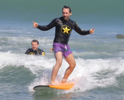 Surfing Lessons by Odysseys Surf School - Learn to surf on Bali’s iconic Kuta Beach with Odysseys Surf School. Join beginner-friendly Bali surf lessons and surf coaching led by AASI-certified instructors, with all equipment provided. Enjoy ocean safety instruction, surfboard hire, and free transfers from Kuta, Seminyak, Legian, Jimbaran, Sanur, and Nusa Dua. Book your Bali surf class, Kuta surf school experience, and discover Bali’s best surf spots today. Surfing Lessons by Odysseys Surf School - Image 2 of 5