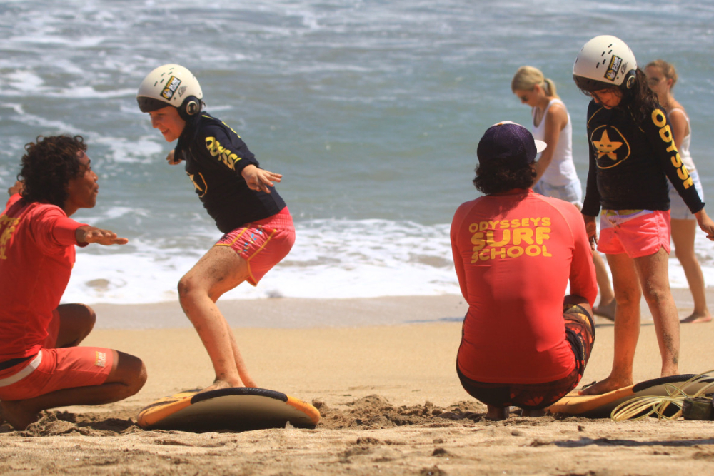 Surfing Lessons by Odysseys Surf School - Learn to surf on Bali’s iconic Kuta Beach with Odysseys Surf School. Join beginner-friendly Bali surf lessons and surf coaching led by AASI-certified instructors, with all equipment provided. Enjoy ocean safety instruction, surfboard hire, and free transfers from Kuta, Seminyak, Legian, Jimbaran, Sanur, and Nusa Dua. Book your Bali surf class, Kuta surf school experience, and discover Bali’s best surf spots today. Surfing Lessons by Odysseys Surf School - Image 5 of 5