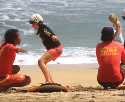Surfing Lessons by Odysseys Surf School - Learn to surf on Bali’s iconic Kuta Beach with Odysseys Surf School. Join beginner-friendly Bali surf lessons and surf coaching led by AASI-certified instructors, with all equipment provided. Enjoy ocean safety instruction, surfboard hire, and free transfers from Kuta, Seminyak, Legian, Jimbaran, Sanur, and Nusa Dua. Book your Bali surf class, Kuta surf school experience, and discover Bali’s best surf spots today. Surfing Lessons by Odysseys Surf School - Image 5 of 5