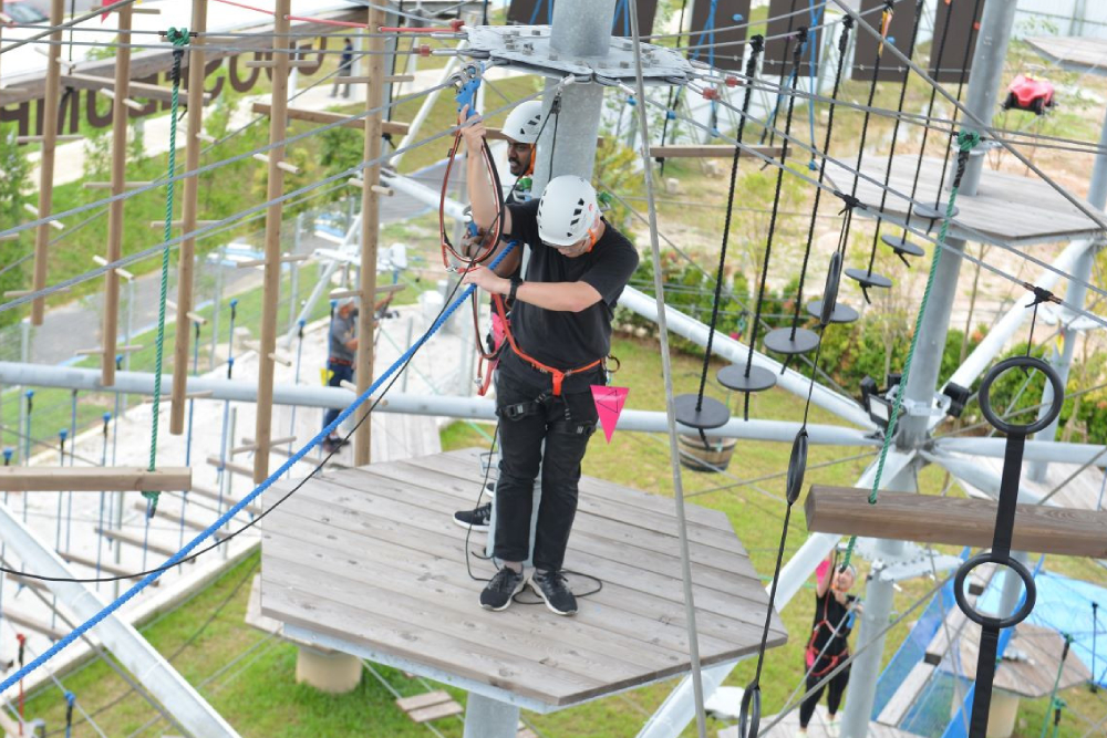 Discovery Park Ticket - Book your Discovery Park Gamuda Cove Admission with JTR Holidays for Malaysia’s top outdoor adventure: tackle the record-breaking rope course, soar on the Cove Aerobar panoramic skyride, enjoy kayaking, zipline, obstacle courses, and family-friendly water play in Gamuda Cove’s lush nature park. Discovery Park Ticket - Image 1 of 5
