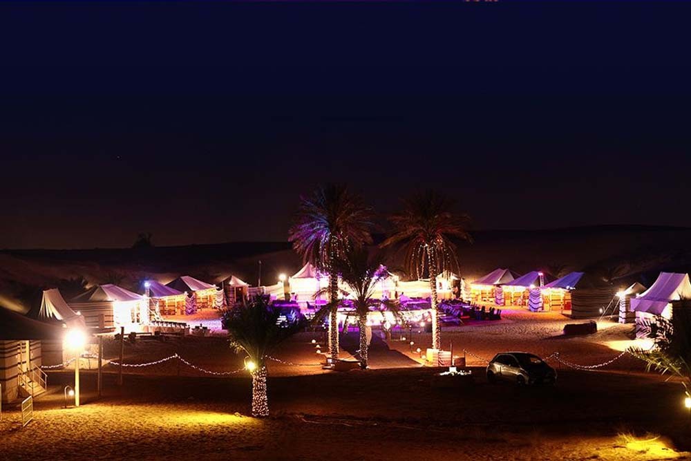 Caravanserai Desert Safari Dubai - We bring the VIP Desert Safari Dubai also known as the Caravan Safari. Learn about a fascinating part of regional history and see the stunning desert setting firsthand, with our incredible catered Dubai Caravan Safari. Our guests will be able to enjoy various different entertainment acts, many of which are traditional to the region, such as belly dancing, Tanura dancing, and a daring fire show. Sit down to a mouth-watering luxury banquet and enjoy the entertainment. Caravanserai Desert Safari Dubai - Image 3 of 5