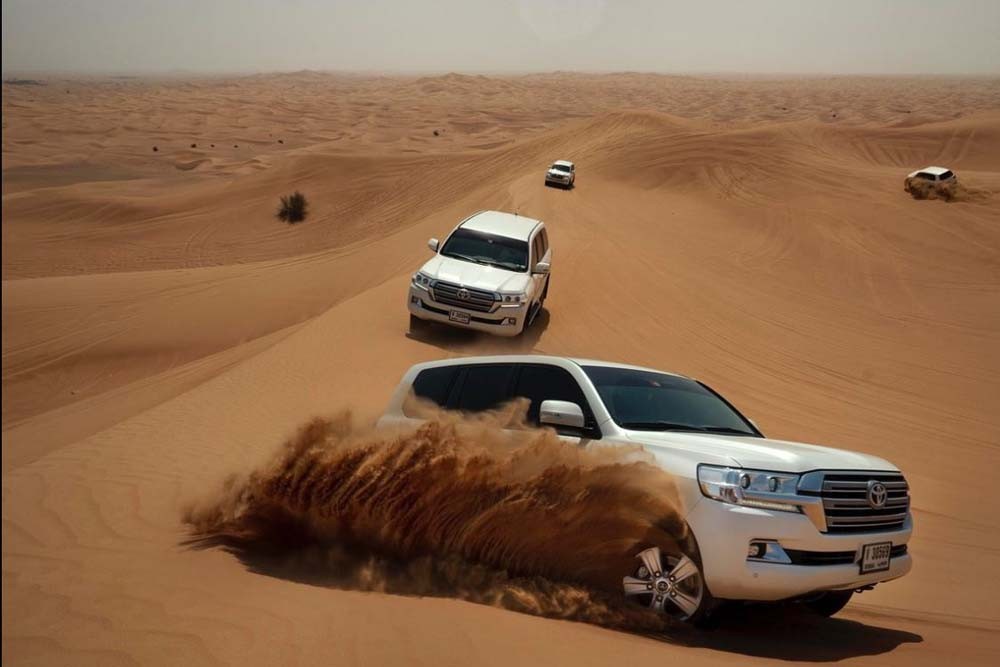 Caravanserai Desert Safari Dubai - We bring the VIP Desert Safari Dubai also known as the Caravan Safari. Learn about a fascinating part of regional history and see the stunning desert setting firsthand, with our incredible catered Dubai Caravan Safari. Our guests will be able to enjoy various different entertainment acts, many of which are traditional to the region, such as belly dancing, Tanura dancing, and a daring fire show. Sit down to a mouth-watering luxury banquet and enjoy the entertainment. Caravanserai Desert Safari Dubai - Image 4 of 5