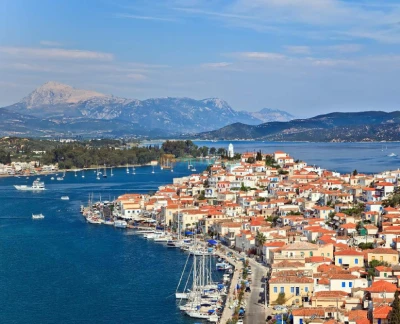 Saronic Islands Cruise Tour From Athens - Set sail on the Athens to Saronic Islands Cruise, a full day Greek island tour visiting Hydra, Poros, and Aegina. Enjoy scenic views, local culture, and island adventures. This relaxing cruise includes onboard lunch, entertainment, and guided tour options perfect for travelers looking to explore the best Greek islands near Athens in one day. Saronic Islands Cruise Tour From Athens - Image 2 of 5