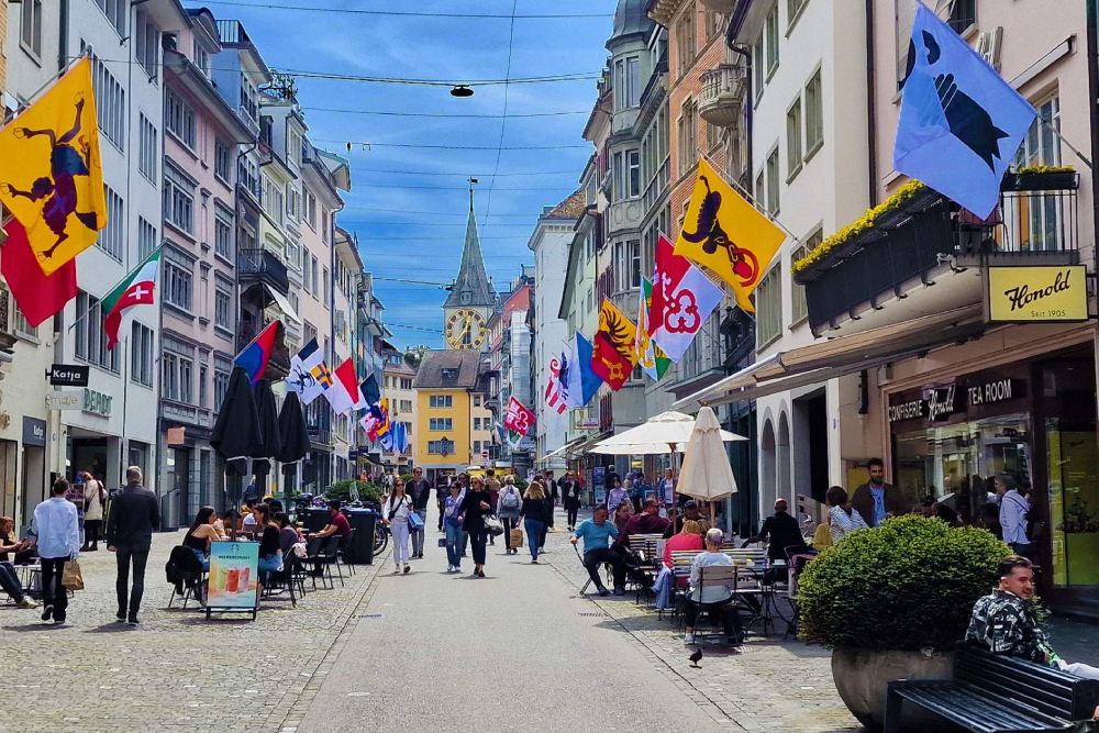 Zurich Sightseeing Bus Tour with Guided Old Town Walk Ticket - Explore Zurich with a scenic sightseeing bus tour and guided Old Town walk. Visit top attractions like Bahnhofstrasse, Lake Zurich, and the Swiss National Museum. Enjoy panoramic views, learn about Zurich’s rich history, and stroll through the charming medieval streets of the Old Town. This half day Zurich city tour is perfect for travelers seeking culture, history, and the best sights in Switzerland’s largest city. Ideal for first-time visitors and anyone wanting a deeper look at Zurich’s highlights. Zurich Sightseeing Bus Tour with Guided Old Town Walk Ticket - Image 1 of 5