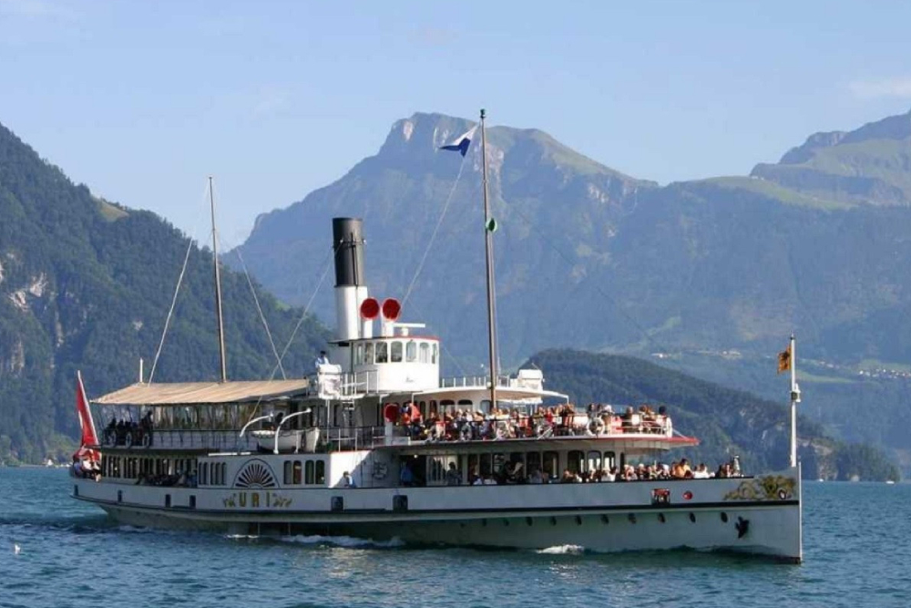 Mount Rigi Tour Ticket - Experience the Mount Rigi Day Tour from Zurich and Lucerne with JTR Holidays. Enjoy a scenic Lake Lucerne cruise, ride Europe’s first cogwheel train, explore Rigi Kulm, and take in breathtaking Swiss Alps views. Includes aerial cable car, guided sightseeing, and free time in Lucerne. Perfect for nature lovers and those seeking a classic Swiss mountain adventure. Book your Mount Rigi tour ticket today for an unforgettable day in Switzerland. Mount Rigi Tour Ticket - Image 5 of 5