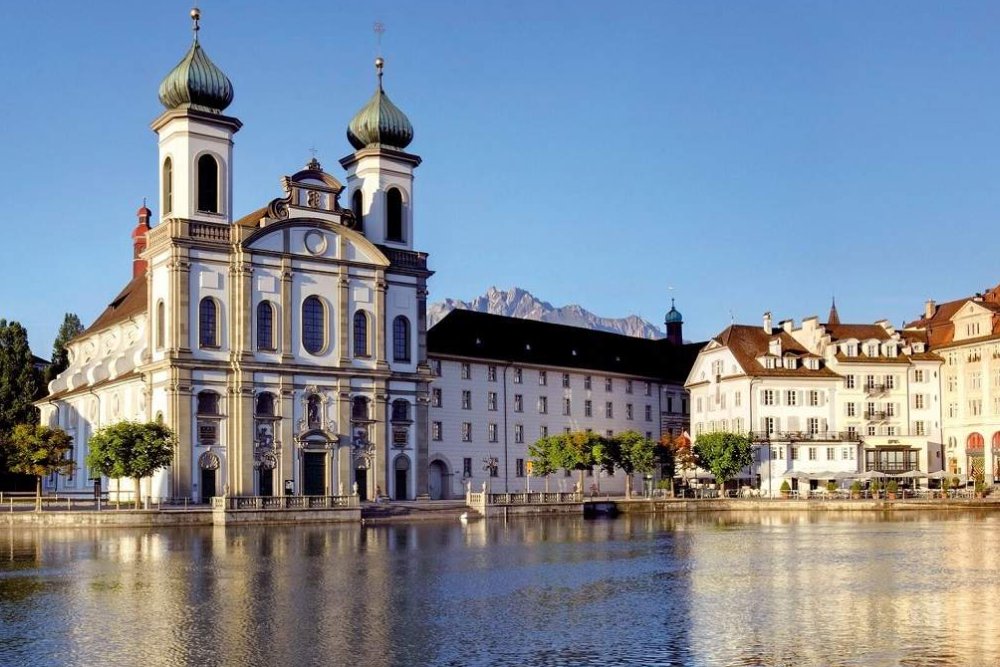 Lucerne City Tour and Yacht Cruise from Zurich Ticket - Book a Lucerne city tour and Lake Lucerne yacht cruise from Zurich. Enjoy a full day trip with guided sightseeing, free time to explore, a scenic boat ride, and visits to top attractions like the Chapel Bridge and Lion Monument. Lucerne City Tour and Yacht Cruise from Zurich Ticket - Image 2 of 5
