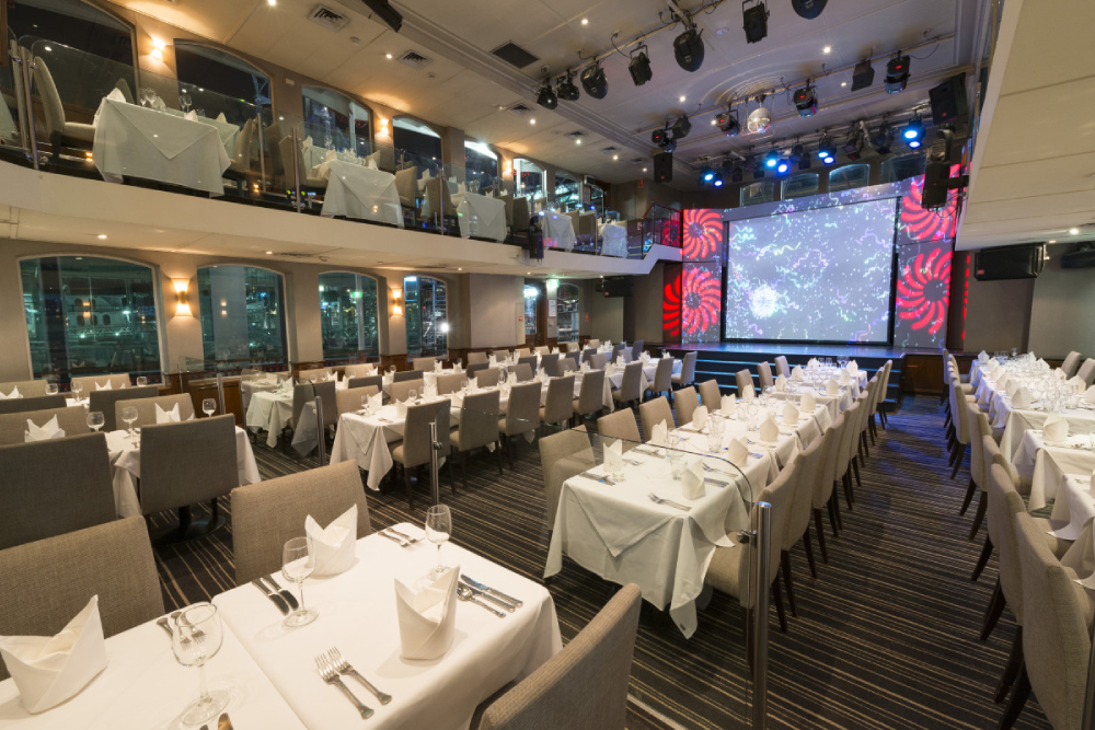 Sydney Harbour Showboat Dinner Cruise Ticket - Enjoy a spectacular Sydney Harbour Dinner Cruise with Show, featuring a gourmet three-course meal, live cabaret entertainment, and stunning night views of the Sydney Opera House, Harbour Bridge, and city skyline. Book your Showboat dinner cruise tickets online for the ultimate Sydney night cruise experience. Sydney Harbour Showboat Dinner Cruise Ticket - Image 1 of 5