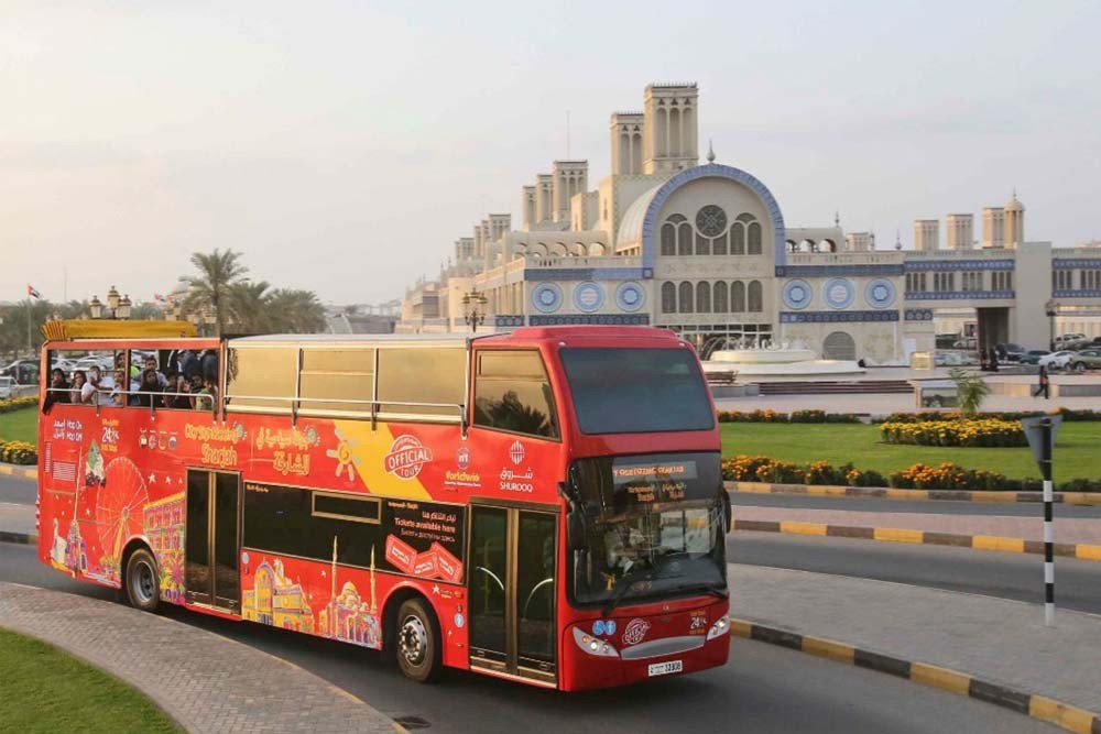City Sightseeing - Sharjah - The City Sightseeing Sharjah tour buses provide visitors with a novel way to discover all its charms and its rich cultural heritage. A day on the on the Hop-On Hop-Off double-decker bus tour allows you to take in the most enjoyable and memorable experiences in Sharjah. Hop on and off between the 2 different bus routes and visit all of the Emirate’s famous landmarks! City Sightseeing - Sharjah - Image 2 of 5