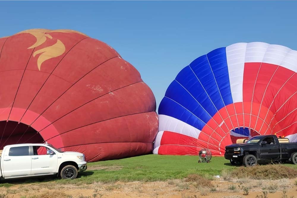 Sunrise Balloon Flights – Ras Al Khaimah - Book Now Ras Al Khaimah hot air balloon. Appreciate the dramatic and spectacular colours of the Northern Emirates. Soar with eagles to a height you may observe wildlife in their natural habitat without disturbing them, where you may see foxes, oryx, camels, and more. Depending on the breeze, we may fly past mangroves, the desert and wadis or towards the majestic Hajar Mountains. Sunrise Balloon Flights – Ras Al Khaimah - Image 2 of 5