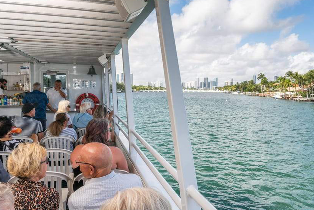 Miami: The Original Millionaire’s Row Cruise - Experience the original Millionaire’s Row Sightseeing Cruise in Miami’s Biscayne Bay. Enjoy stunning coastal views, celebrity homes, and the vibrant city skyline on this relaxing 90 minute boat tour with flexible departure times. Miami: The Original Millionaire’s Row Cruise - Image 3 of 5