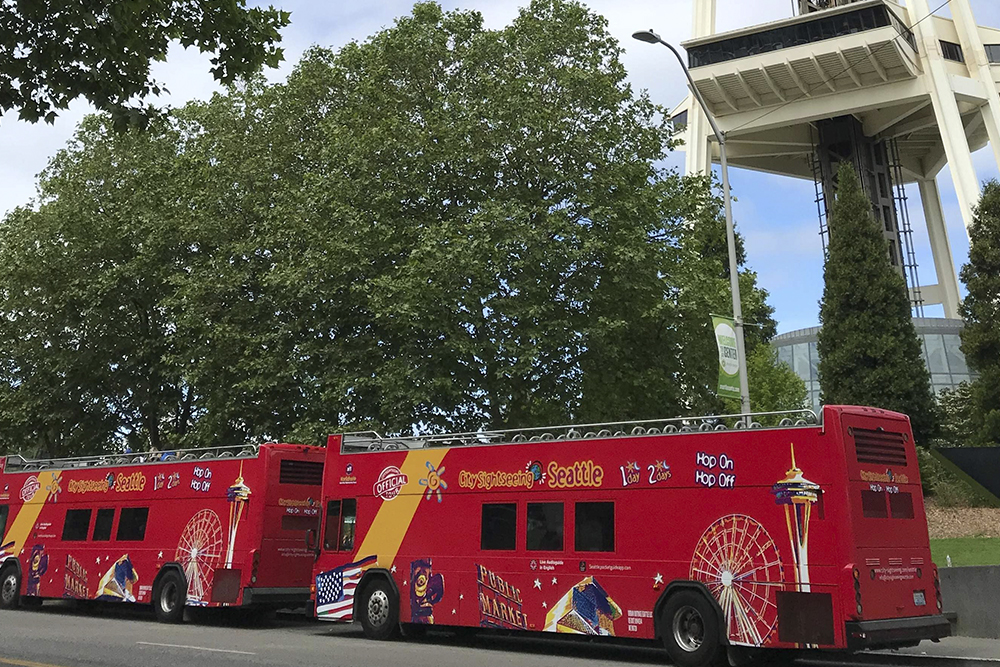 Seattle Hop-On Hop-Off Bus by City Sightseeing Ticket - Discover Seattle’s top attractions with the City Sightseeing Hop-On Hop-Off Bus Tour. Enjoy panoramic views from an open top bus, hop on and off at your favorite spots, and explore landmarks like Pike Place Market, Space Needle, and waterfront at your own pace. Perfect for first time visitors and locals alike. Seattle Hop-On Hop-Off Bus by City Sightseeing Ticket - Image 3 of 5