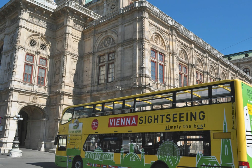 Vienna Sighteeing Hop-On Hop-Off Bus Ticket - Explore Vienna with flexible Hop‑On Hop‑Off bus tickets. Visit top attractions like Schönbrunn Palace, St. Stephen’s Cathedral, the Ringstraße & Belvedere. Unlimited sightseeing, free audio guide & panoramic views of Austria’s capital. Vienna Sighteeing Hop-On Hop-Off Bus Ticket - Image 1 of 5