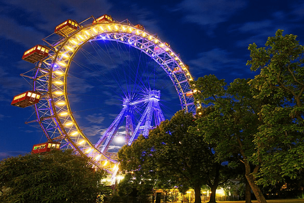 Vienna's Giant Ferris Wheel - Ride Vienna’s iconic Giant Ferris Wheel in the Prater park for breathtaking city views. Discover its rich history and book Wiener Riesenrad tickets online for a timeless experience. Vienna's Giant Ferris Wheel - Image 3 of 5