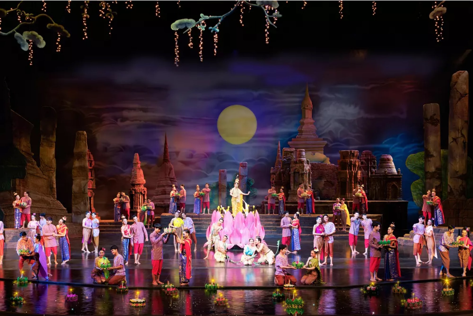 Siam Niramit Show Phuket - Siam Niramit Show Phuket offers a breathtaking journey through Thailand’s rich history and culture. The Siam Niramit Show Phuket takes you back in time, showcasing ancient Siam’s customs, rituals, and beliefs. Explore the three realms of Thai tradition, including Heaven, Hell, and the mystical Himapaan Forest, in the Siam Niramit Show Phuket. With stunning performances and beautiful visuals, the Siam Niramit Show Phuket is a must-see experience for all who visit Phuket. Discover the magic of Siam Niramit Show Phuket and dive deep into Thailand’s cultural heritage. Siam Niramit Show Phuket - Image 4 of 5