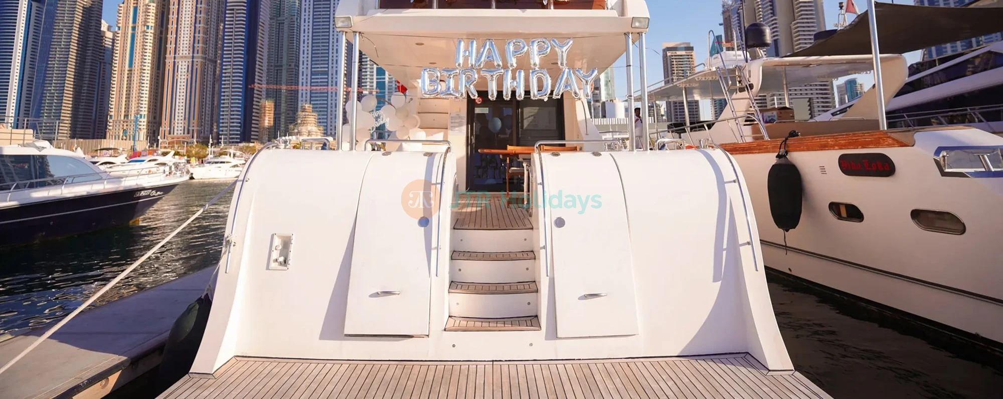 Yacht Birthday Party in Dubai - Luxury Yacht with Decoration and Cake - JTR Holidays