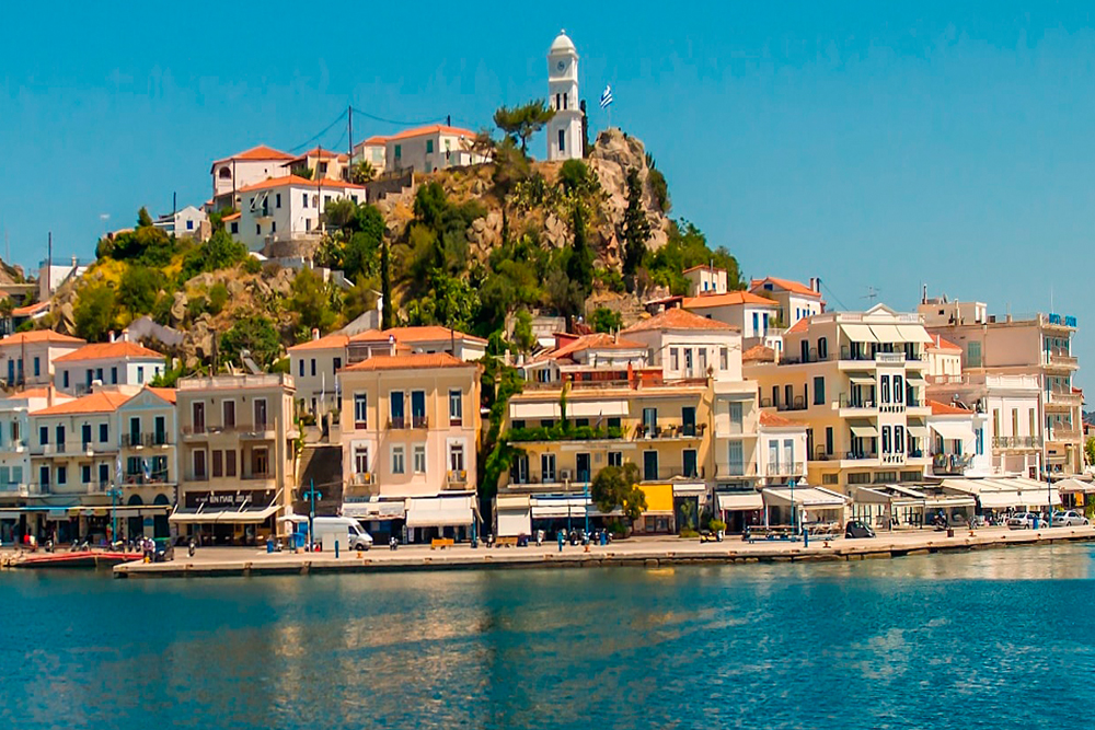 Saronic Islands Cruise Tour From Athens - Set sail on the Athens to Saronic Islands Cruise, a full day Greek island tour visiting Hydra, Poros, and Aegina. Enjoy scenic views, local culture, and island adventures. This relaxing cruise includes onboard lunch, entertainment, and guided tour options perfect for travelers looking to explore the best Greek islands near Athens in one day. Saronic Islands Cruise Tour From Athens - Image 4 of 5