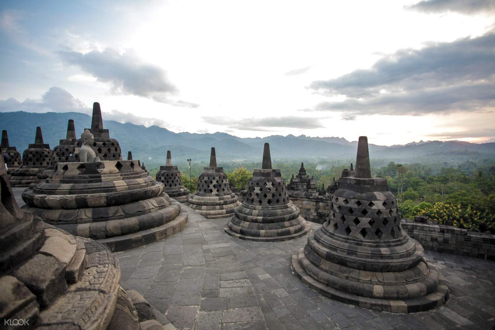 Borobudur Temple - Explore Borobudur Temple in Yogyakarta, the world’s largest Buddhist monument built by the Sailendra Dynasty. Enjoy courtyard access, ancient reliefs, and a meaningful cultural experience without summit entry. Borobudur Temple - Image 3 of 5