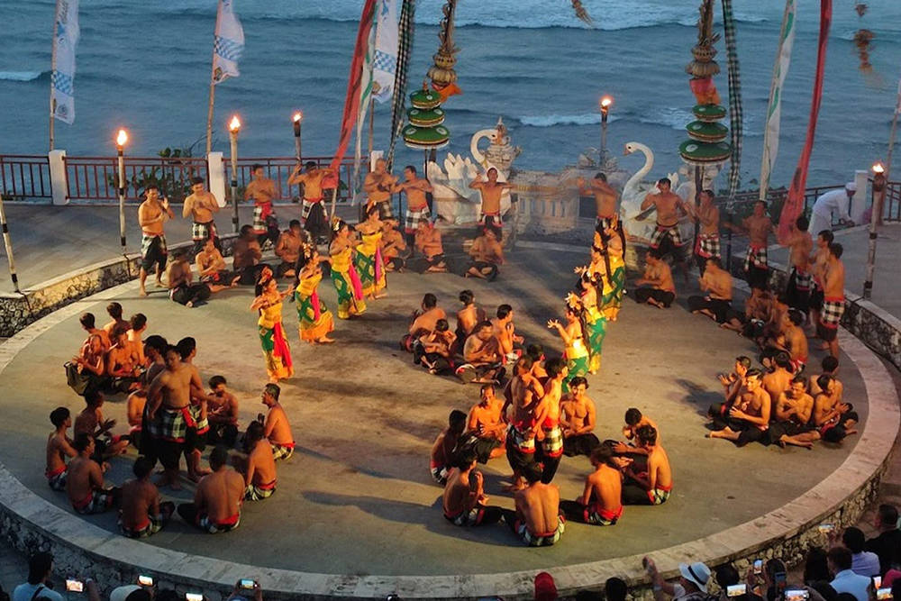 Melasti Beach Kecak Dance Show - Experience the magic of Melasti Beach, Bali – enjoy stunning sunsets, traditional Kecak dance performances, exciting water sports, peaceful hidden beaches, and scenic coastal hikes. Your perfect Bali adventure awaits! Melasti Beach Kecak Dance Show - Image 3 of 5