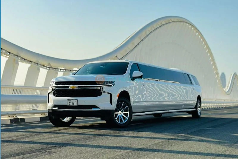 2024 Chevy Suburban Titanium White Limousine (20 pax)