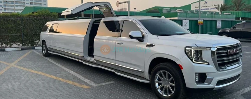 GMC Yukon Limousine Ride Dubai (18 Pax) - Limousine Ride Dubai, Make your trip memorable with a luxury limousine ride to explore Dubai. chauffeur service Dubai. There are many ways to explore Dubai. But nothing is better than a lavish ride to explore the world's most famous city. Choose from a number of luxury limousines and take a sightseeing ride in the city of gold. GMC Yukon Limousine Ride Dubai (18 Pax) - Image 3 of 5