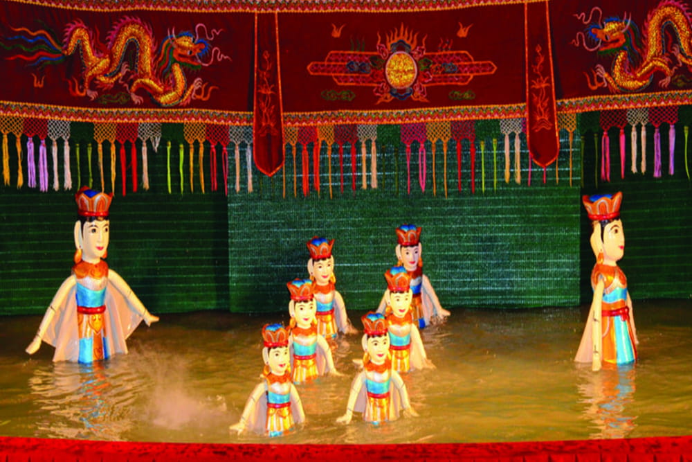 Golden Water Puppet Ticket in Ho Chi Minh City - Experience Vietnam’s iconic water puppet show in Ho Chi Minh City. Enjoy folk tales, live traditional music, and intricate puppetry on a unique water stage. Golden Water Puppet Ticket in Ho Chi Minh City - Image 3 of 5