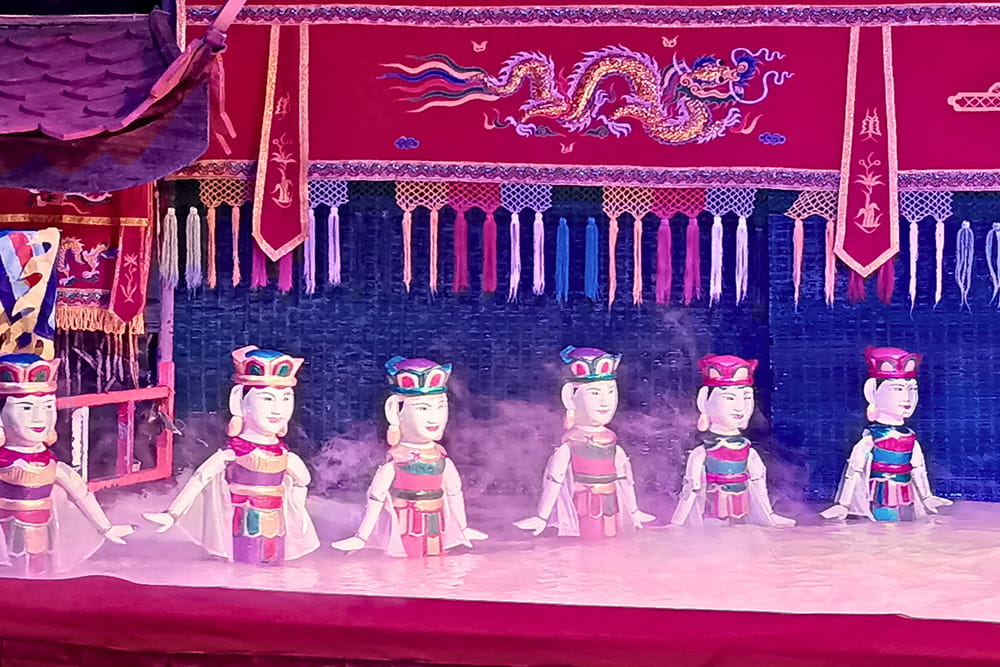 Golden Water Puppet Ticket in Ho Chi Minh City - Experience Vietnam’s iconic water puppet show in Ho Chi Minh City. Enjoy folk tales, live traditional music, and intricate puppetry on a unique water stage. Golden Water Puppet Ticket in Ho Chi Minh City - Image 4 of 5