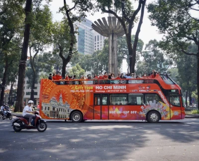 City Sightseeing Ho Chi Minh Hop-on Hop-off Bus Tour - Explore Ho Chi Minh City at your own pace with a flexible Hop-On Hop-Off bus tour. Enjoy top landmarks, unlimited rides, and multilingual audio commentary. City Sightseeing Ho Chi Minh Hop-on Hop-off Bus Tour - Image 2 of 5