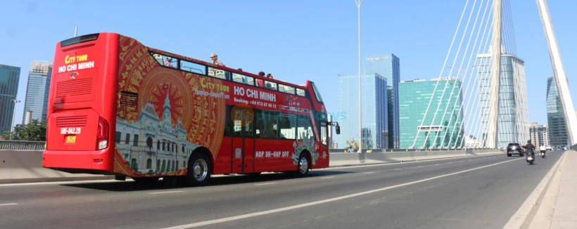 City Sightseeing Ho Chi Minh Hop-on Hop-off Bus Tour - Explore Ho Chi Minh City at your own pace with a flexible Hop-On Hop-Off bus tour. Enjoy top landmarks, unlimited rides, and multilingual audio commentary. City Sightseeing Ho Chi Minh Hop-on Hop-off Bus Tour - Image 4 of 5