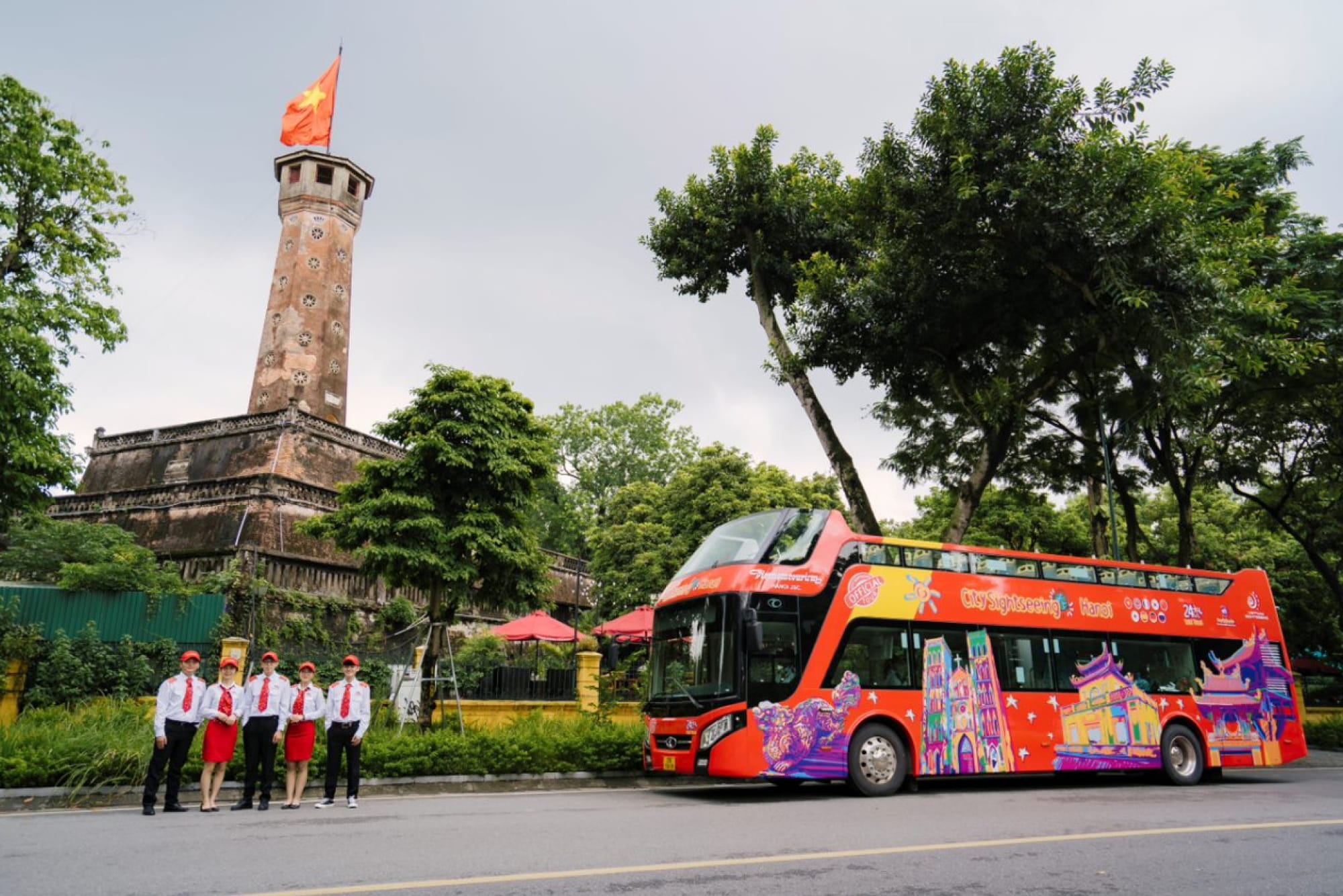 City Sightseeing Hanoi Hop-on Hop-off Bus Tour - Explore Hanoi at your own pace with a hop‑on hop‑off open‑top bus tour. Visit top attractions like Hanoi Cathedral, Tran Quoc Pagoda, and the Opera House with multilingual audio guides. City Sightseeing Hanoi Hop-on Hop-off Bus Tour - Image 1 of 5