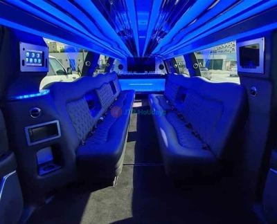 Cadillac Escalade Black Panther - (20 Pax) - Take Limousine Dubai, sit back in the most comfortable and luxurious stretch limousine and explore each corner of the City. This luxury limo ride is the best way to explore the highlights of Dubai from the comfort of a seat. Our Cadillac Escalade Black Panther limousine capacity is 24 passengers. Limousine ride in Dubai can be booked as per the size of the group. Cadillac Escalade Black Panther - (20 Pax) - Image 2 of 5