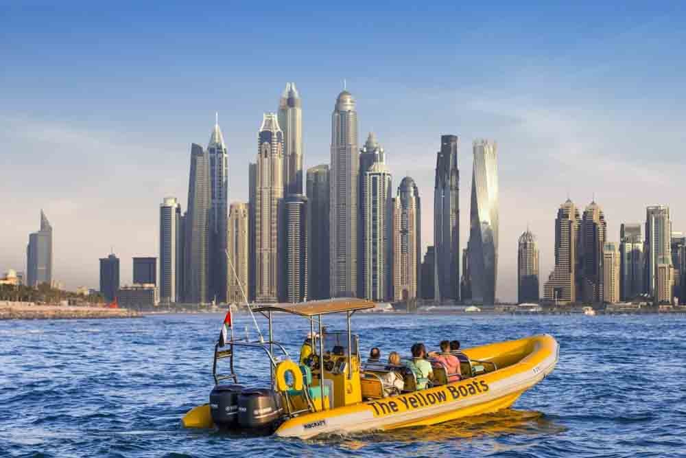 Yellow Boat Tour Dubai - Yellow Boat Dubai is one of the most memorable sightseeing tour in Dubai. Experience the thrill of Yellow Boat Dubai's exhilarating tours and discover the beauty of Dubai's iconic landmarks from the water. Get ready for an unforgettable adventure as you sail past Burj Al Arab, Palm Jumeirah, and more. Book now and embark on a journey that will leave you with lasting memories. Don't miss out on this incredible experience Yellow Boat Tour Dubai - Image 5 of 5