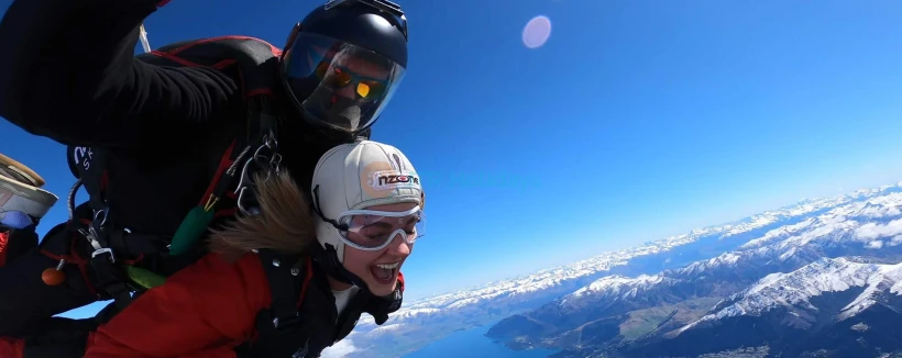 Skydive Queenstown Experience by NZONE - Experience thrilling tandem skydiving in Queenstown from 9,000 to 15,000 ft. Enjoy up to 60 seconds of free fall at 200 km/h with stunning Lake Wakatipu views. Safe, professional, and unforgettable. Skydive Queenstown Experience by NZONE - Image 4 of 5