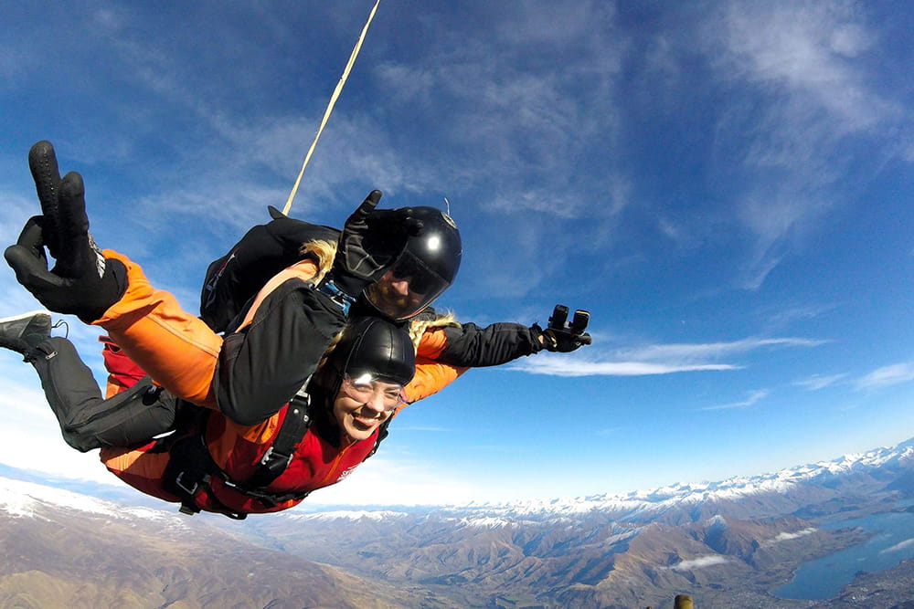 Wanaka Tandem Skydive Over Southern Alps - Experience a Wanaka tandem skydive from 9,000 to 15,000 ft with stunning views of Mt. Cook, Southern Alps, alpine lakes, and the Clutha River. Wanaka Tandem Skydive Over Southern Alps - Image 1 of 5