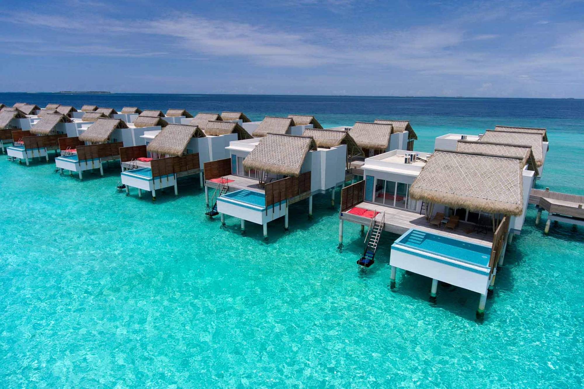 Emerald Maldives Resort & Spa All-Inclusive Package – 4 Nights / 5 Days - Experience a luxury escape at Emerald Maldives Resort & Spa with premium all-inclusive dining, beachfront & overwater villas, water sports, and family friendly activities in stunning Raa Atoll. Perfect for couples and families seeking relaxation and adventure. Emerald Maldives Resort & Spa All-Inclusive Package – 4 Nights / 5 Days - Image 1 of 5