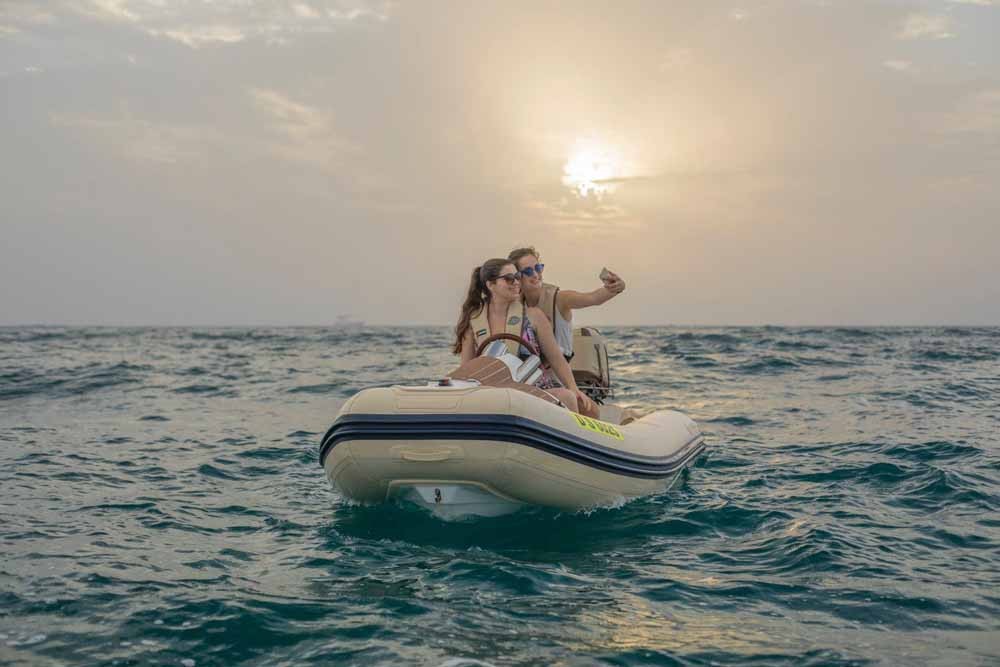 Dubai Sunset Hero Boat Tour - Explore the incredible artificial archipelago of various small islands constructed in the rough shape of a world map known as The World Islands. Enjoy a spectacular sunset view over the water before returning to the marina for freshly grilled Arabian prawns and sparkling date juice. Dubai Sunset Hero Boat Tour - Image 5 of 5